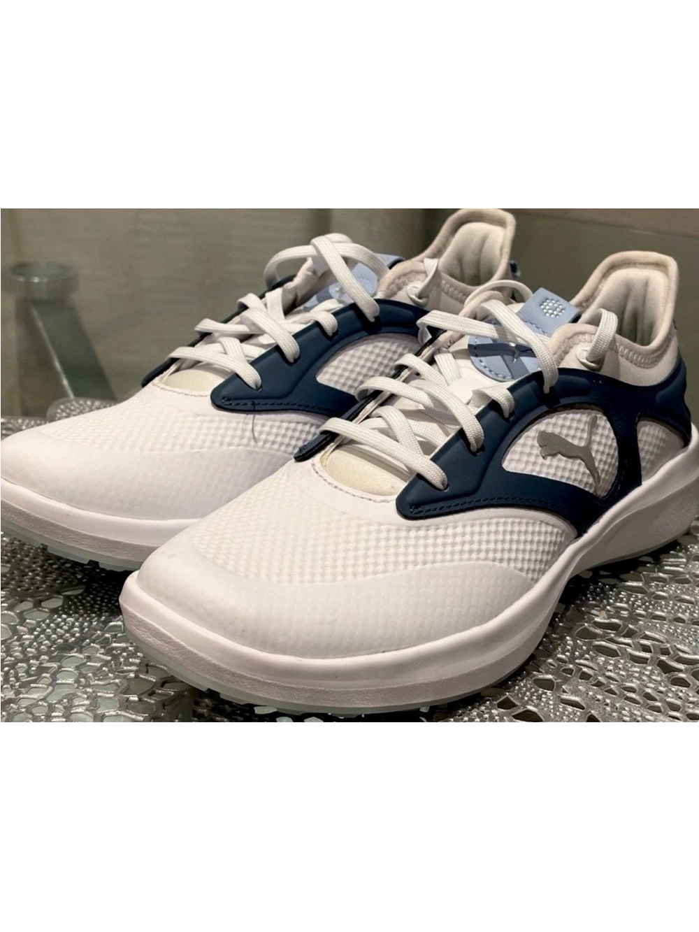 Puma Women's Ignite Malibu Golf Shoes. Size US 7.5 in white and blue sneakers